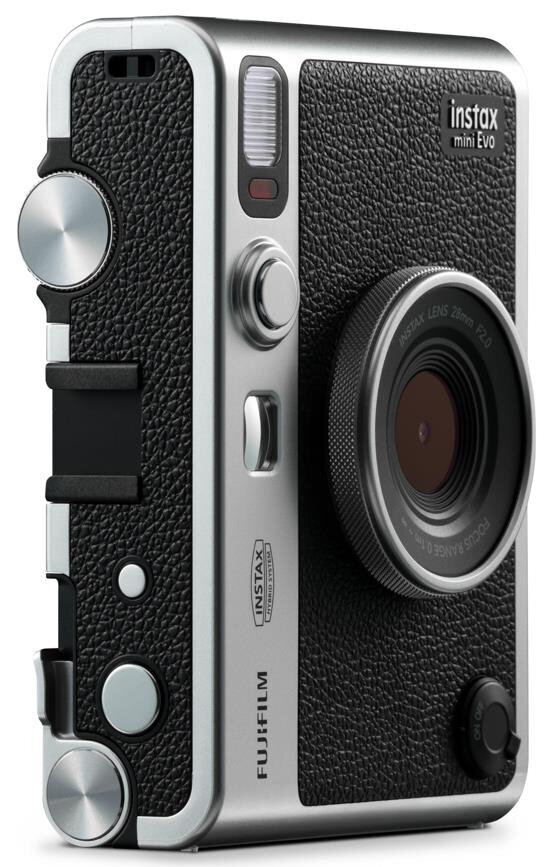 Czarno-srebrny aparat retro, z widocznym obiektywem i lampą błyskową.