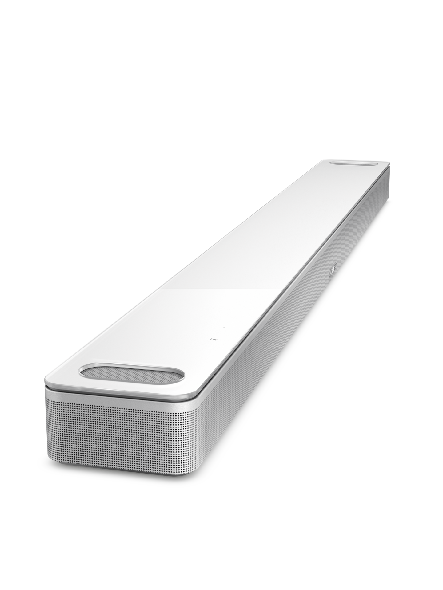 Weiße Soundbar. Sie hat einen Lautsprechergrill und einen kleinen vertieften Bereich.