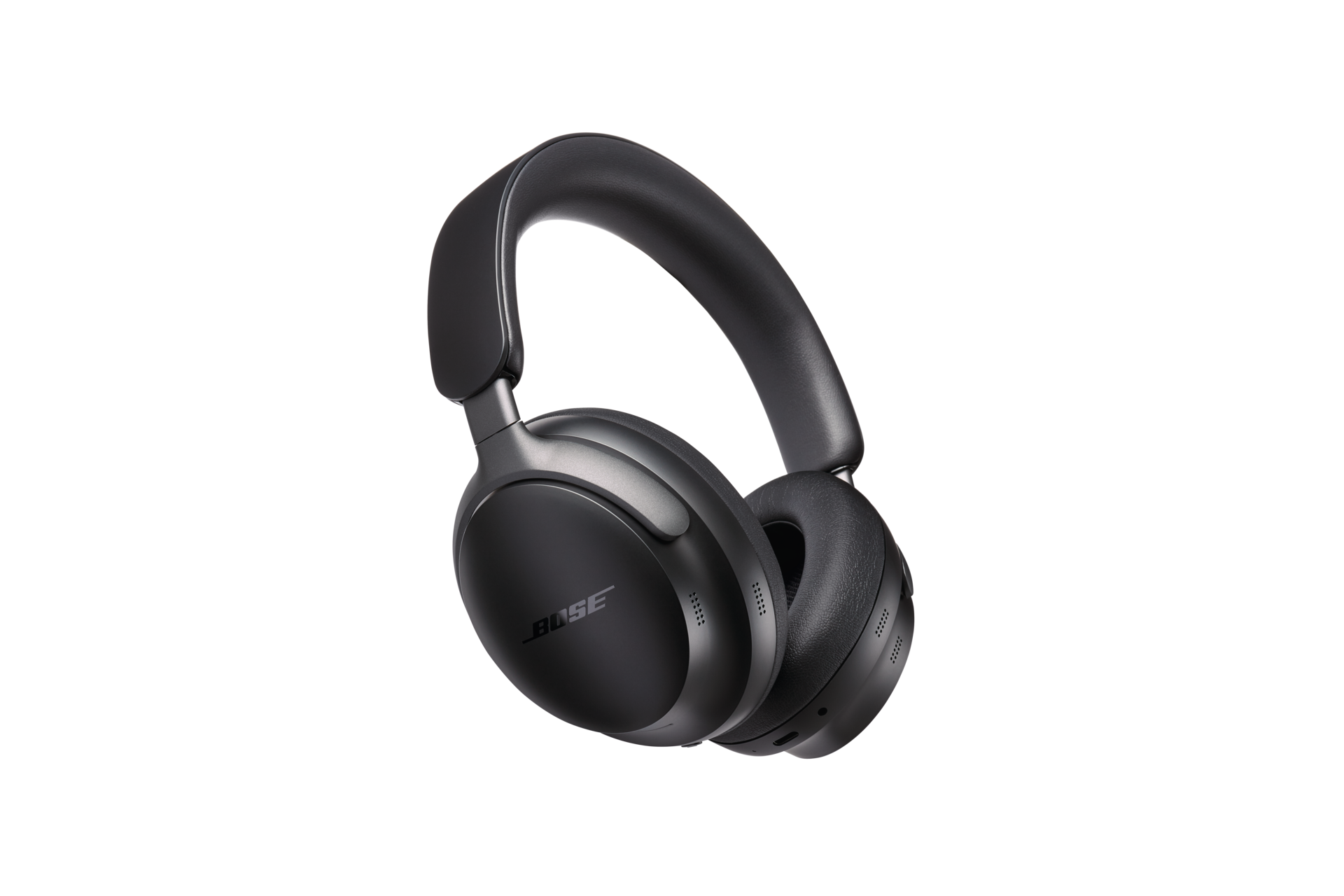 Schwarze Bose-Kopfhörer auf schwarzem Hintergrund. Die Kopfhörer haben Over-Ear-Design.