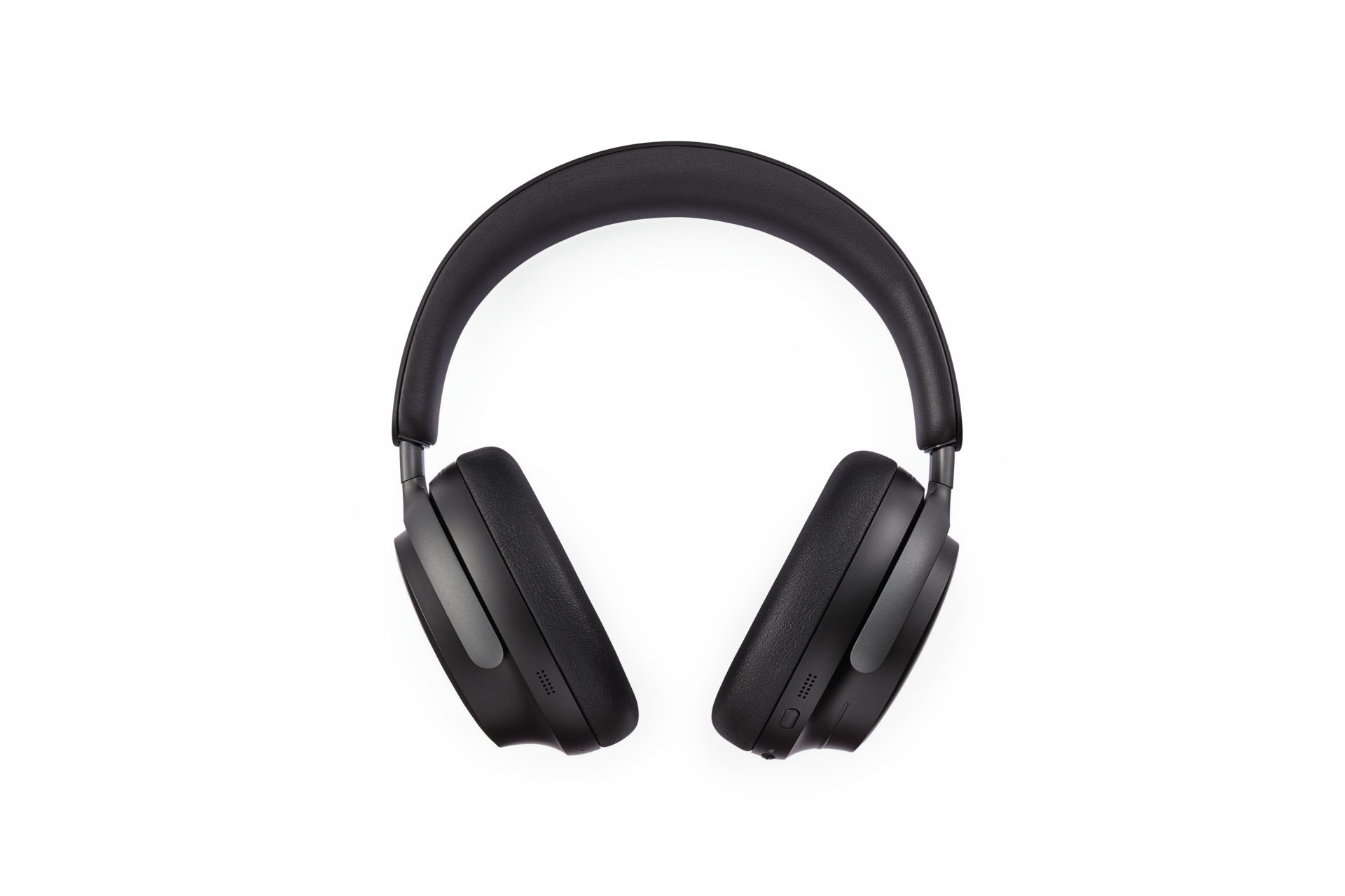 Ein Paar schwarze Over-Ear-Kopfhörer, isoliert auf einem schwarz-weißen Hintergrund.