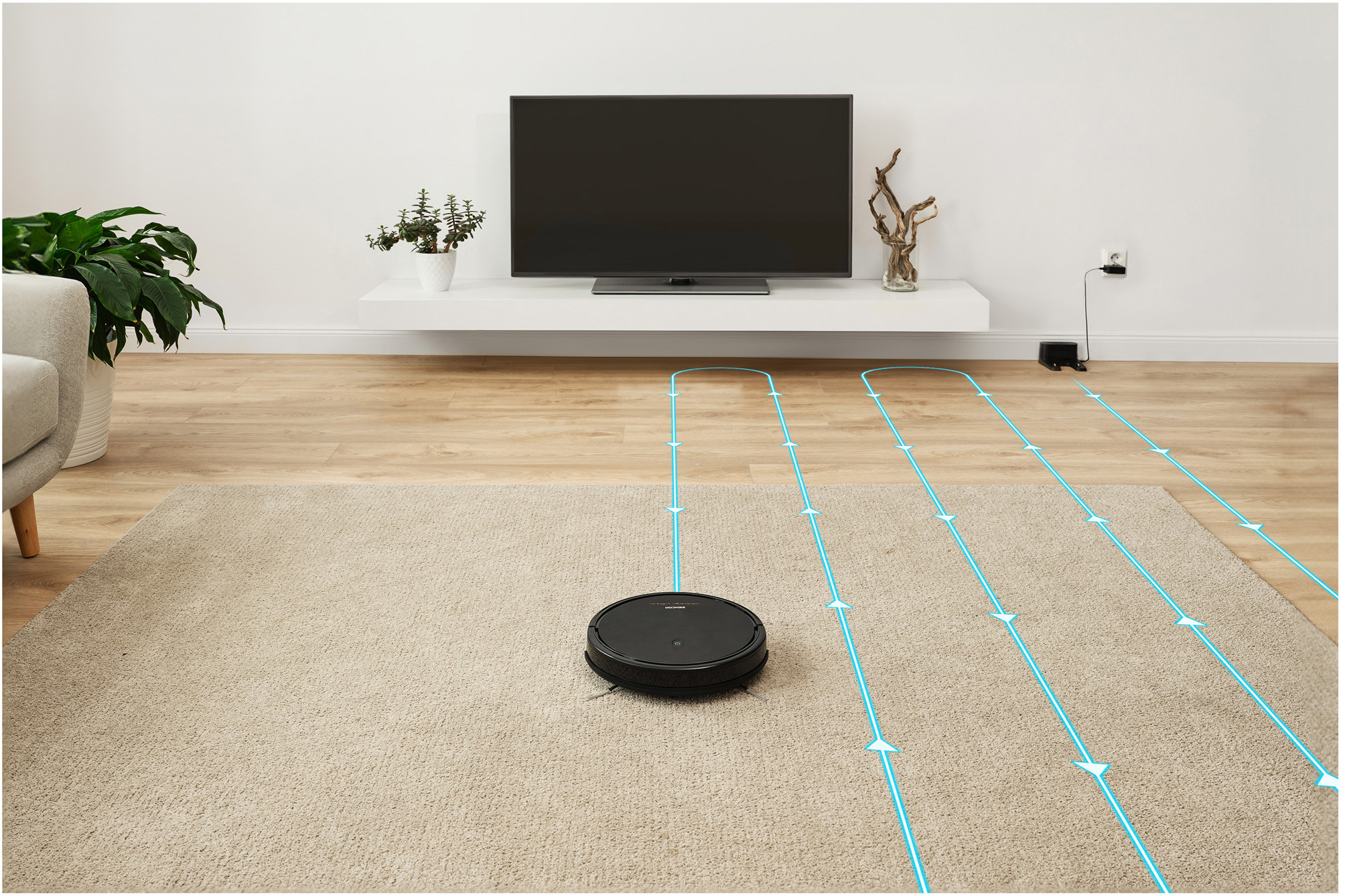 Egy robot porszívó takarít egy szőnyeget. Kék vonalak jelzik a tisztítási utat.