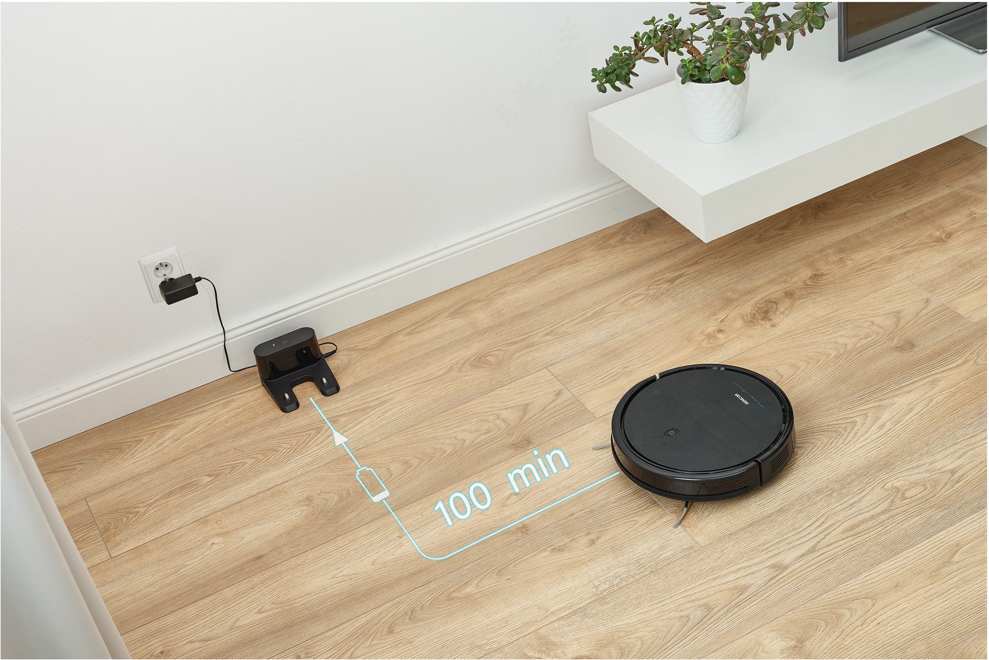 Fekete robotporszívó fa padlón, töltőállomással és 100 perces jelzővel.