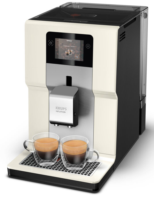 Kremowo-czarny ekspres do kawy z dwoma szklanymi filiżankami espresso.