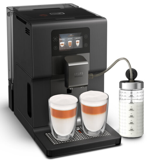 Czarny ekspres do kawy Krups Intuition z dwiema szklankami latte i pojemnikiem na mleko.