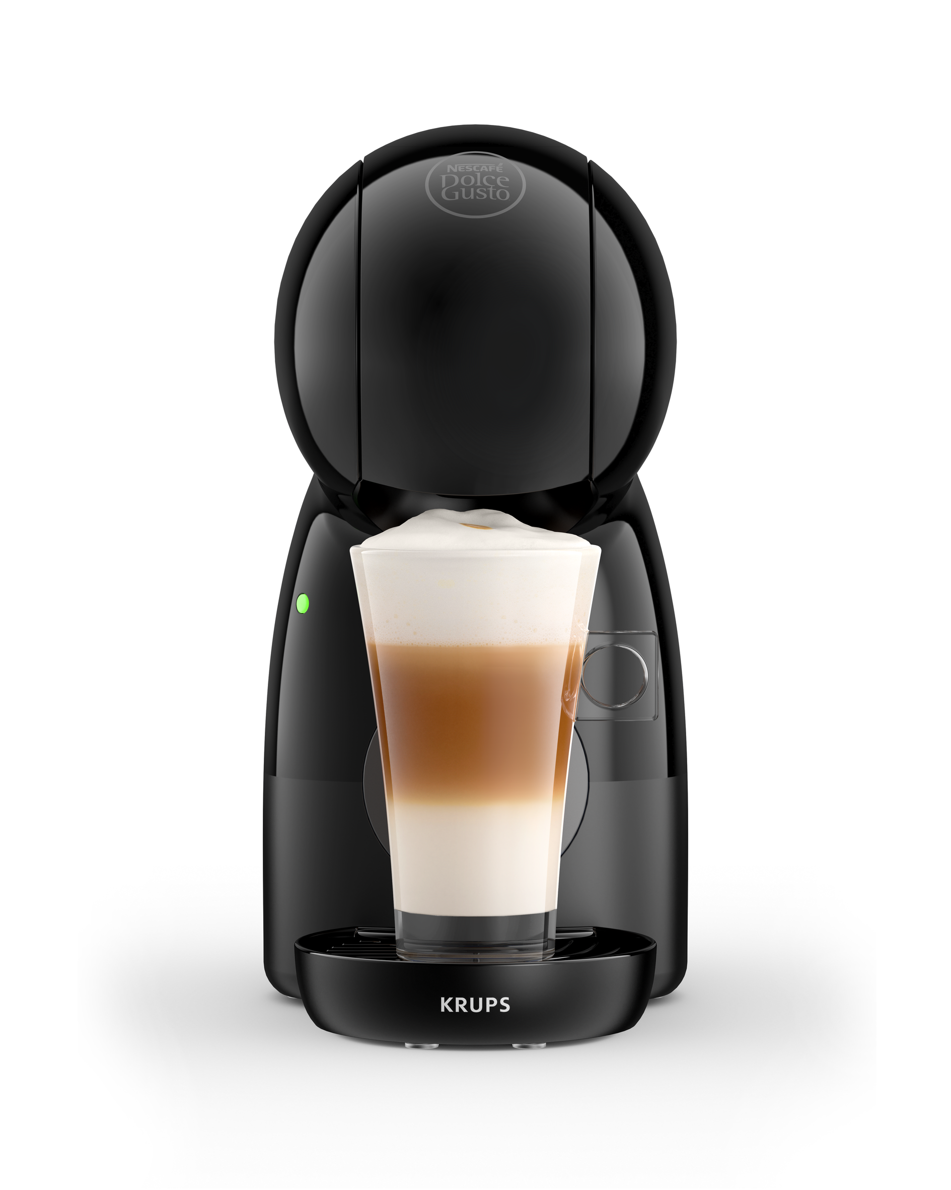 Máquina de café Krups negra con un latte en un vaso, sobre un fondo blanco.