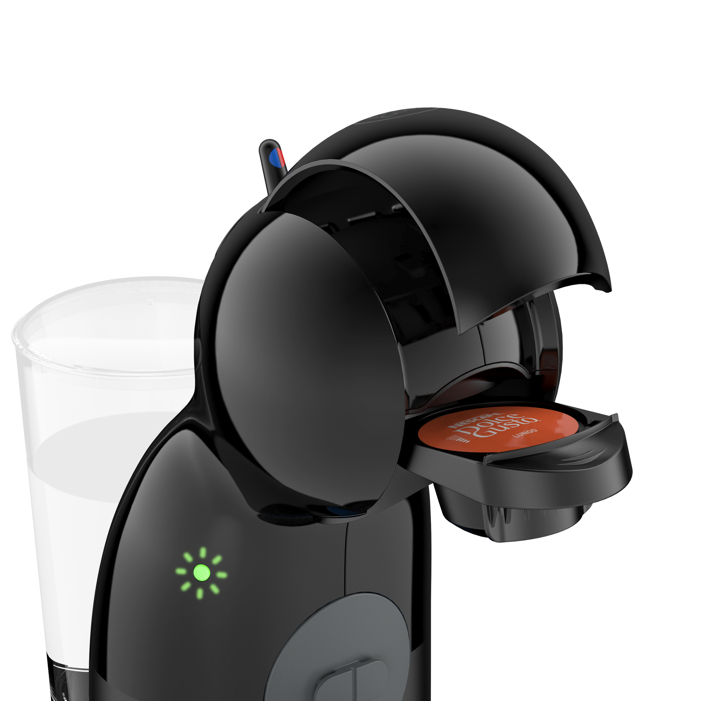 Máquina de café negra con tapa abierta. Cápsula roja dentro, vaso de agua claro.