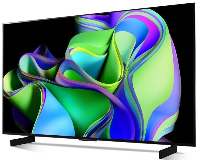Duży, nowoczesny telewizor z abstrakcyjnym, kolorowym wyświetlaczem, na czarnym stojaku.
