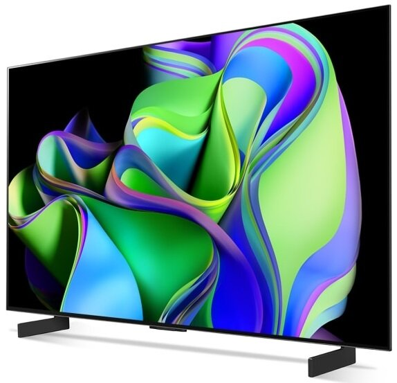 Duży, nowoczesny telewizor z zakrzywionym, kolorowym, abstrakcyjnym obrazem na ekranie.