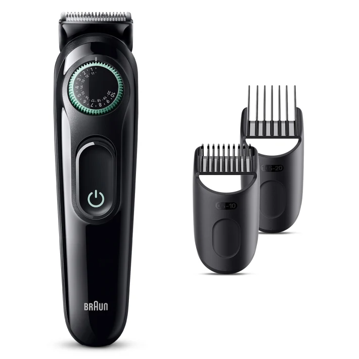 Egy fekete Braun szakállvágó tartozékokkal fehér felületen. A trimmer teljes nézetben.