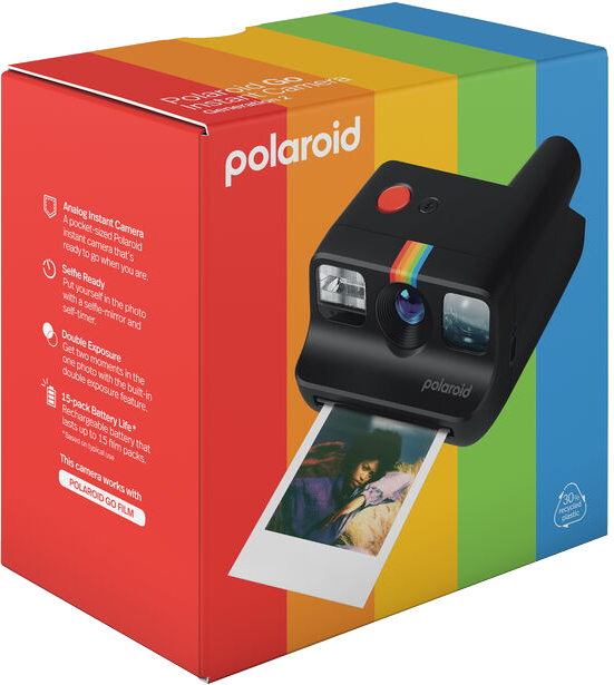 Polaroid kamera szivárványos dobozban. A kamera egy fotót ad ki.
