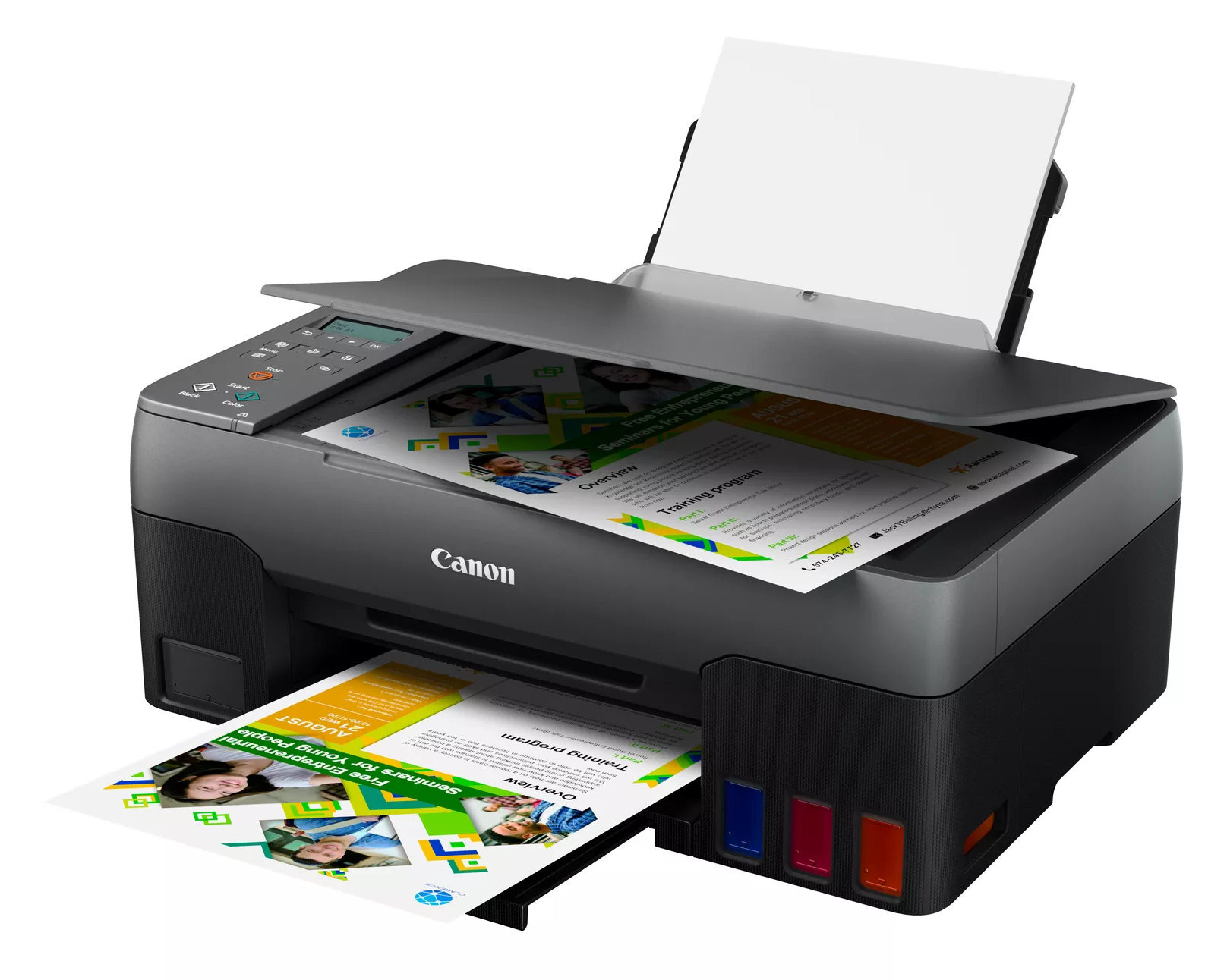 Drukarka Canon drukująca dokumenty. Taca wyjścia papieru otwarta, pokazująca strony z kolorowymi wydrukami.