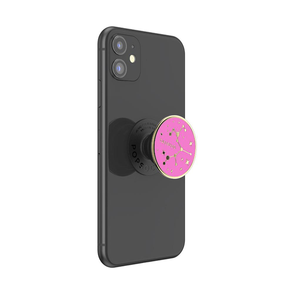 Schwarzes Telefon mit pinkfarbenem PopSocket mit Sternbilddesign.