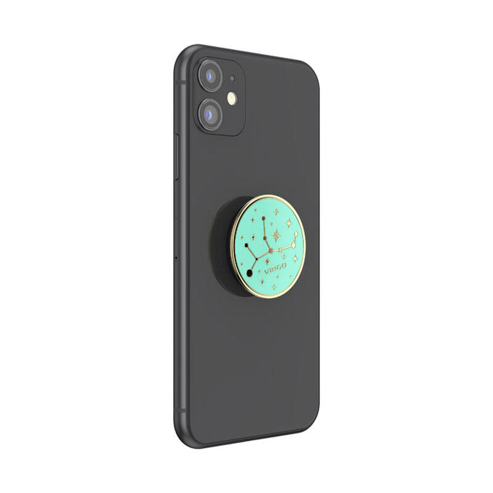 Schwarzes Telefon mit einem mintgrünen Pop-Socket. Der Pop-Socket hat ein Sternbild-Design.