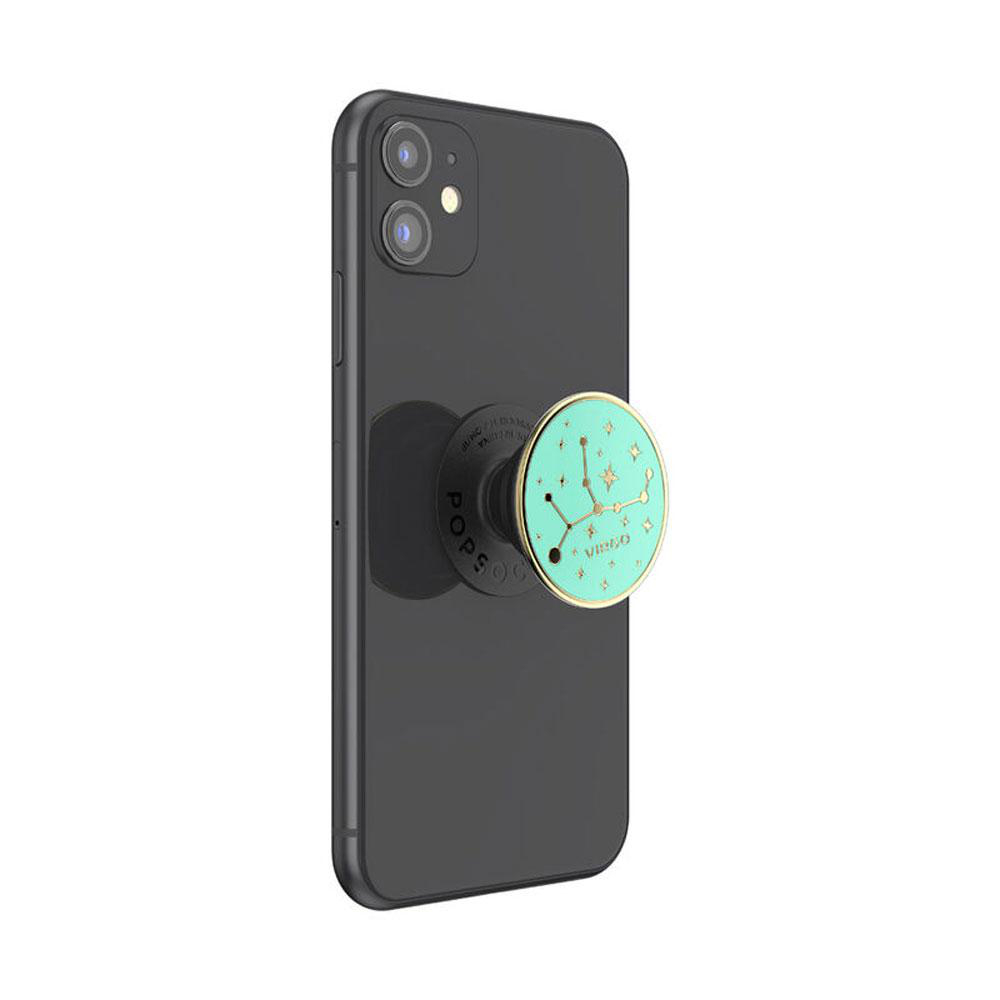 Schwarzes Telefon mit einem Pop-Socket. Der Pop-Socket ist mintgrün mit einem Gold- und Sterndesign.