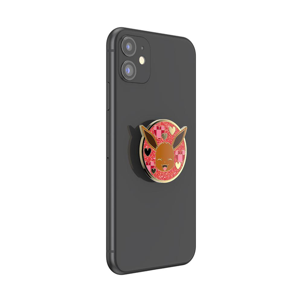 Schwarzes Telefon mit einem Eevee-Handygriff, vor weißem Hintergrund.