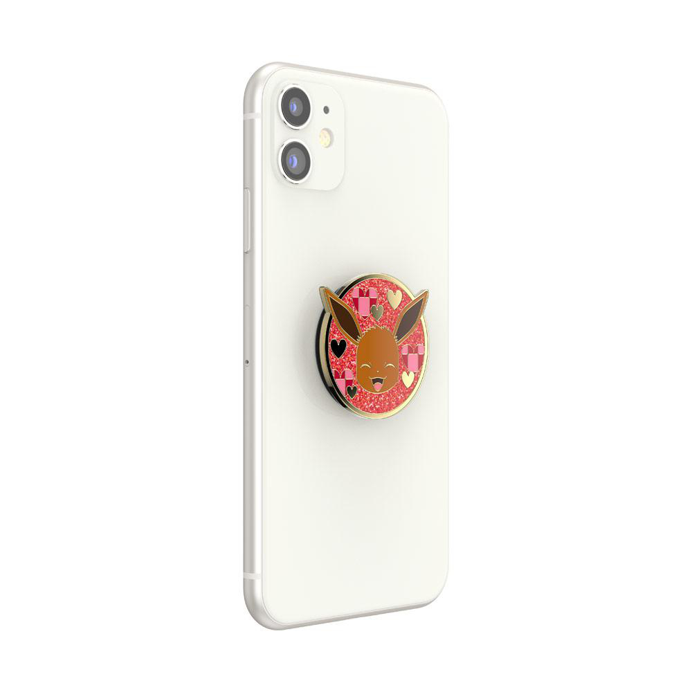 Weißes Telefon mit pinkfarbenem PopSocket mit Evoli-Design.