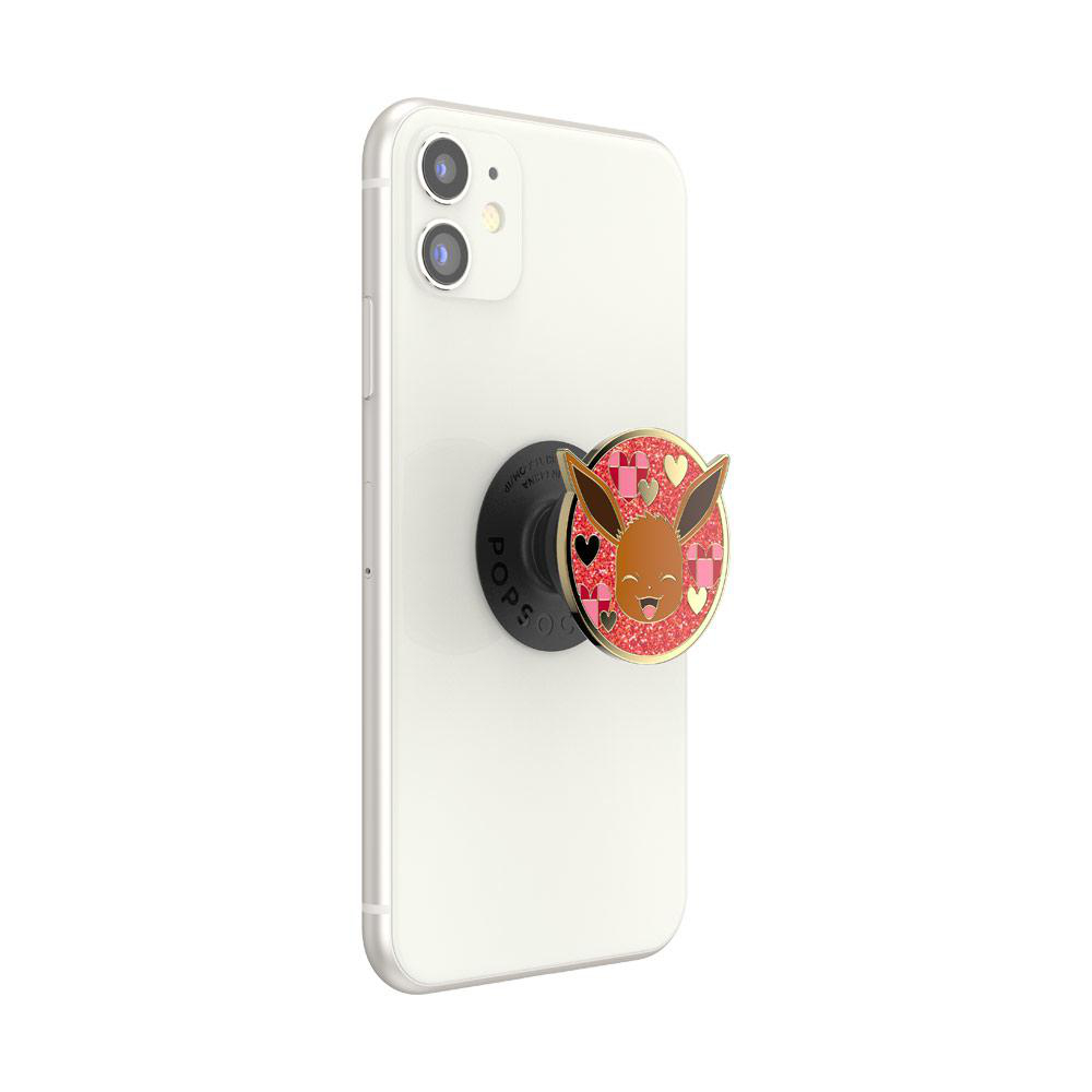 Ein schwarzes Telefon mit einem Mickey Mouse Pop-up-Griff auf der Rückseite.