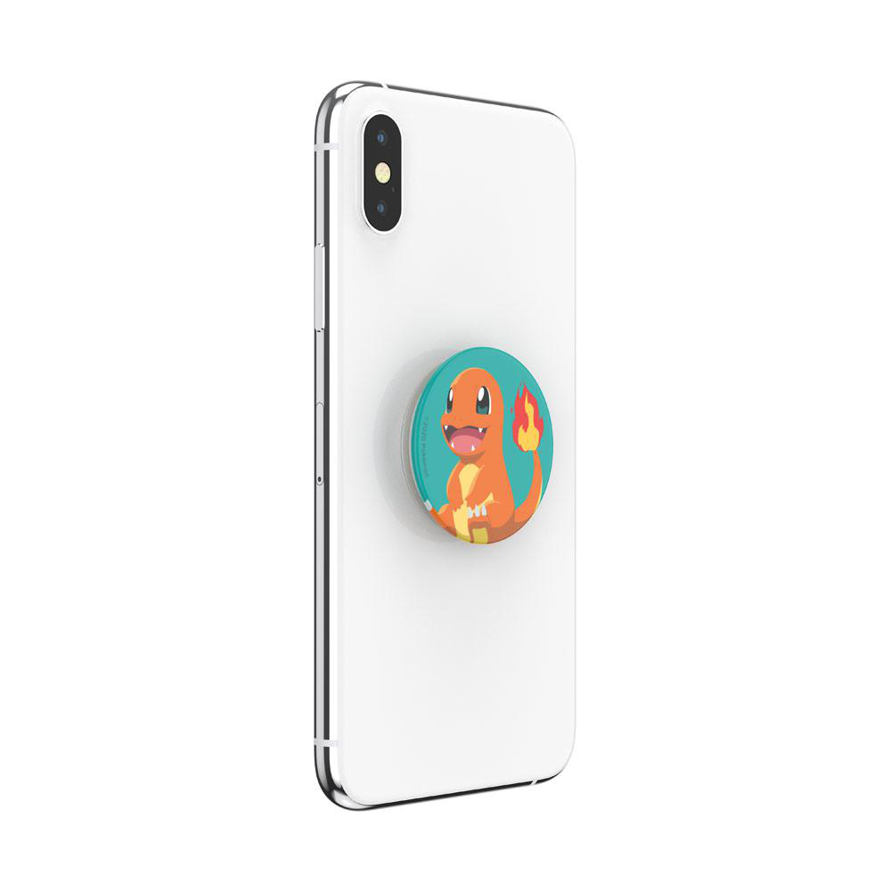 Weißes Telefon mit einem PopSocket. Der PopSocket ist türkis und hat ein Charmander-Design.