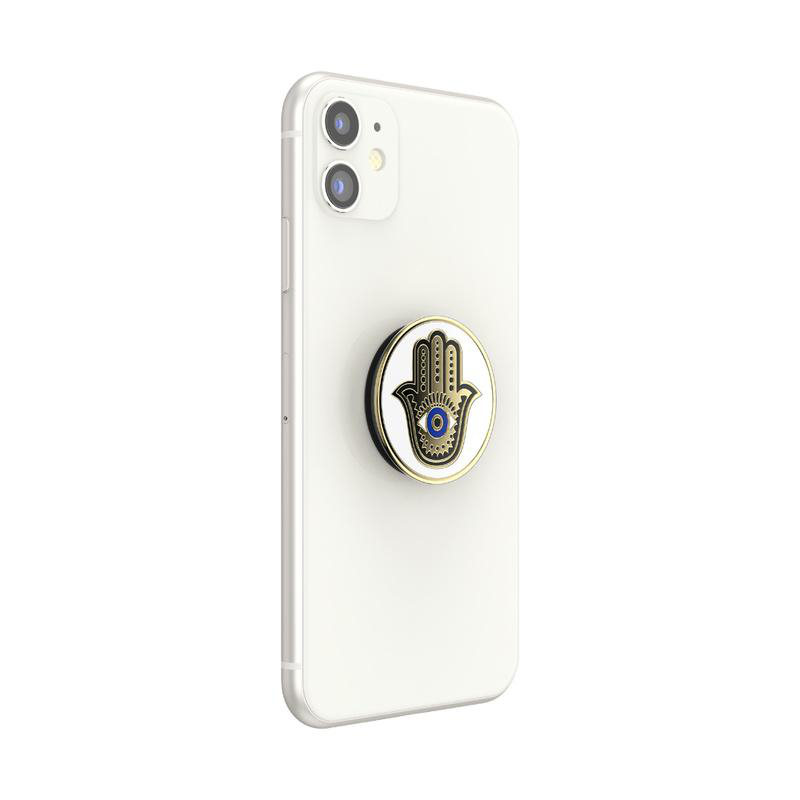 Smartphone mit einem PopSocket mit einem goldenen Hamsa-Hand-Design mit blauem Auge.