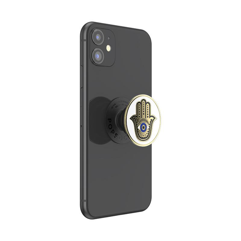 Schwarzes Telefon mit einem Pop-Socket. Der Pop-Socket hat ein Hand-mit-Auge-Design.
