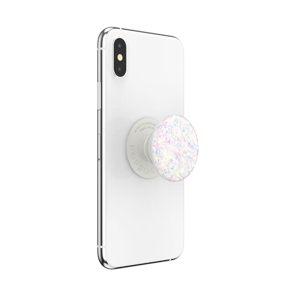 Ein weißes Telefon mit einem glitzernden Popsocket.