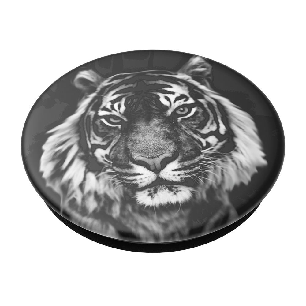 Ein schwarz-weiß Tiger PopSocket, das Gesicht des Tigers zeigend. Der Hintergrund ist dunkel.