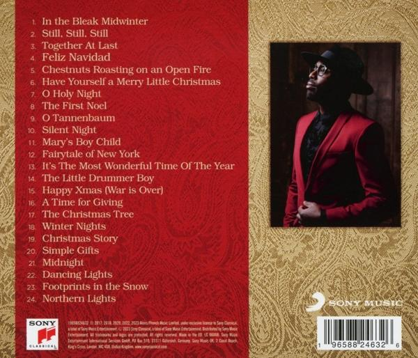 Ein CD-Cover mit einer Titelliste und einem Foto eines Mannes in roter Jacke.