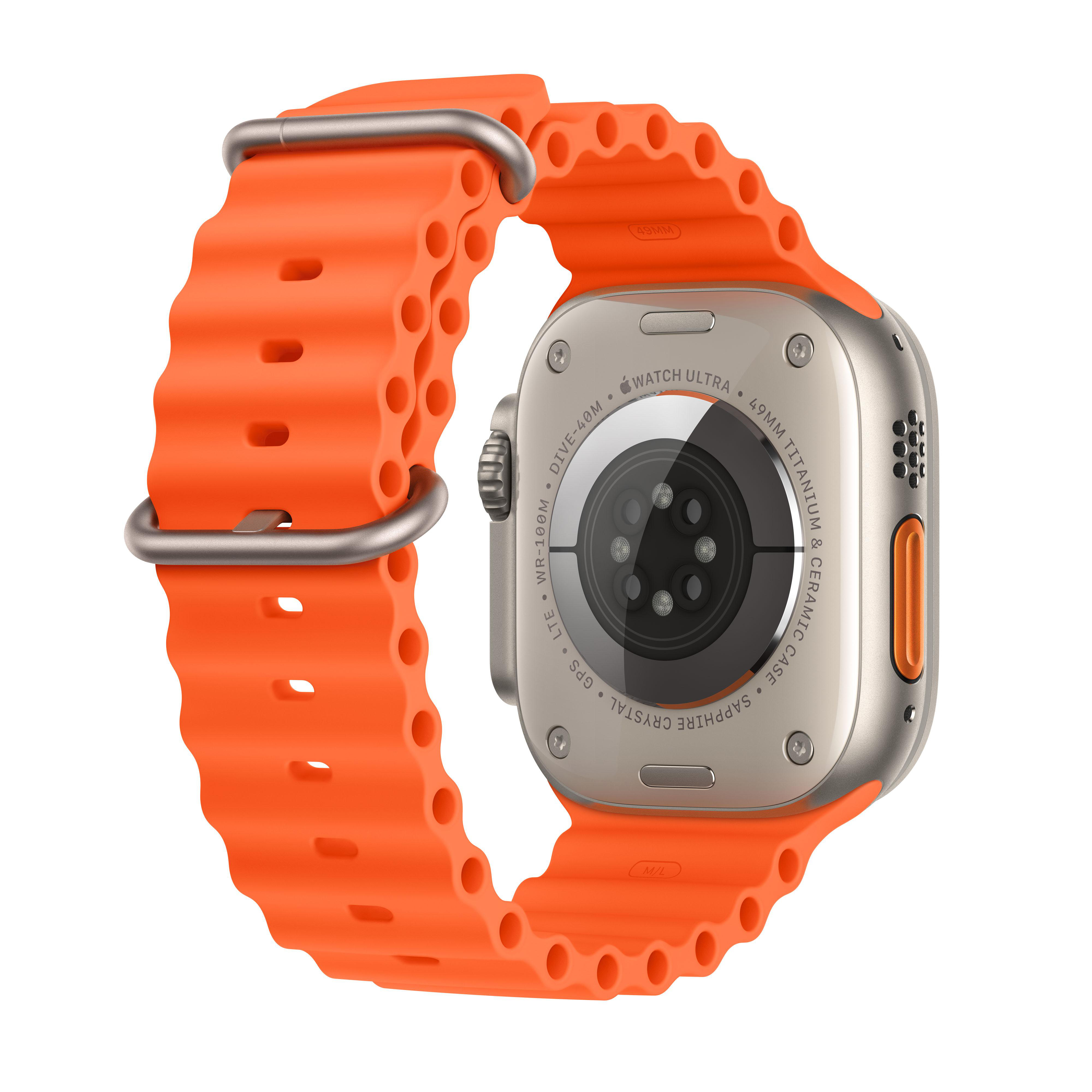 Apple Watch Ultra mit orangefarbenem Armband, Rückseite mit Sensoren und Seitentaste.