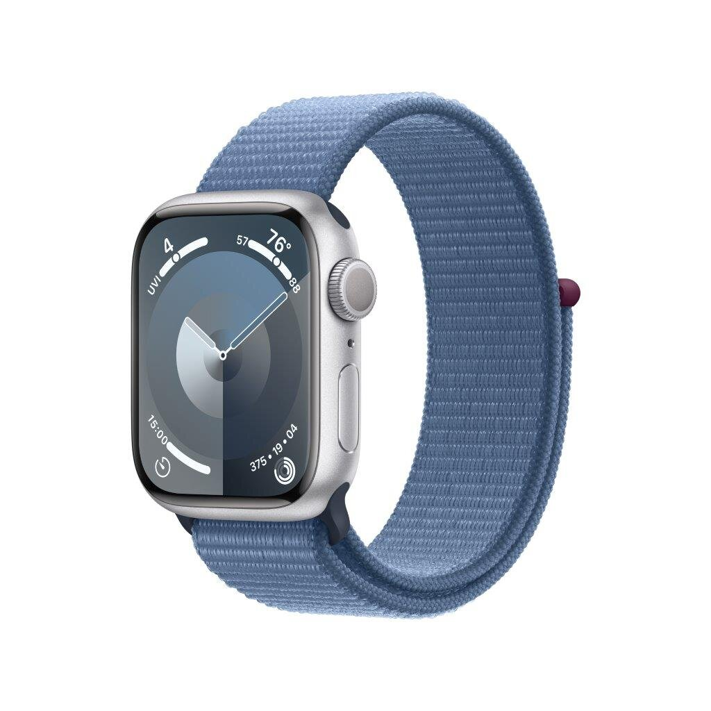 Srebrny Apple Watch z niebieskim paskiem z tkaniny, wyświetlający godzinę i inne dane. Pasek jest owinięty wokół zegarka.