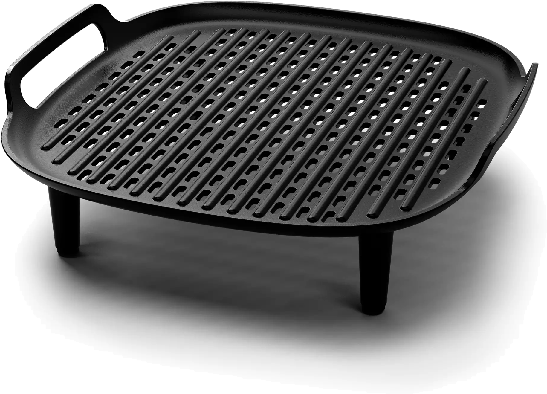 Egy fekete grill serpenyő négyzet alakú és megemelt lábakkal. Sok párhuzamos nyílása van.