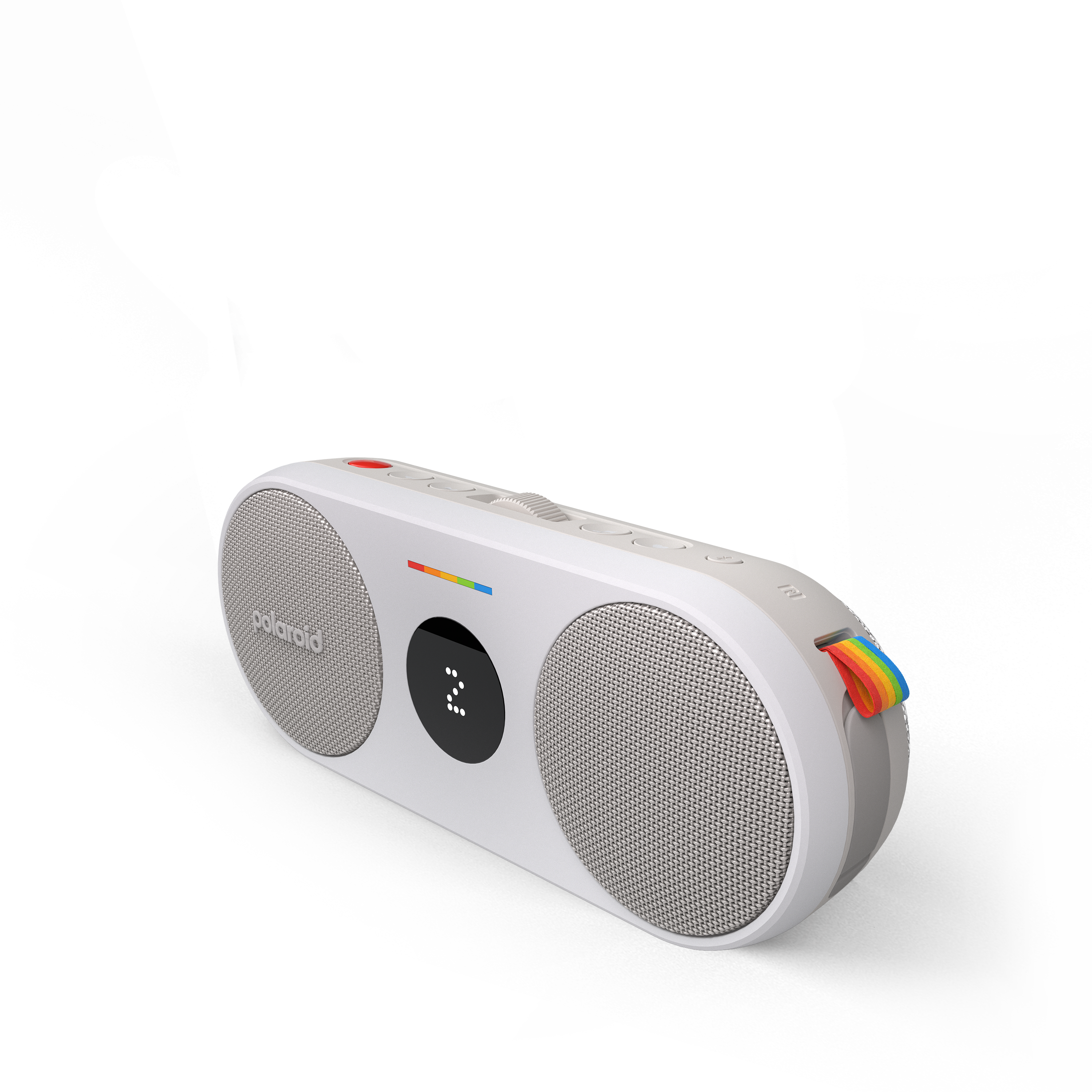 Gökkuşağı şeritli, düğmeli ve ekranlı beyaz bir Polaroid Bluetooth hoparlör.
