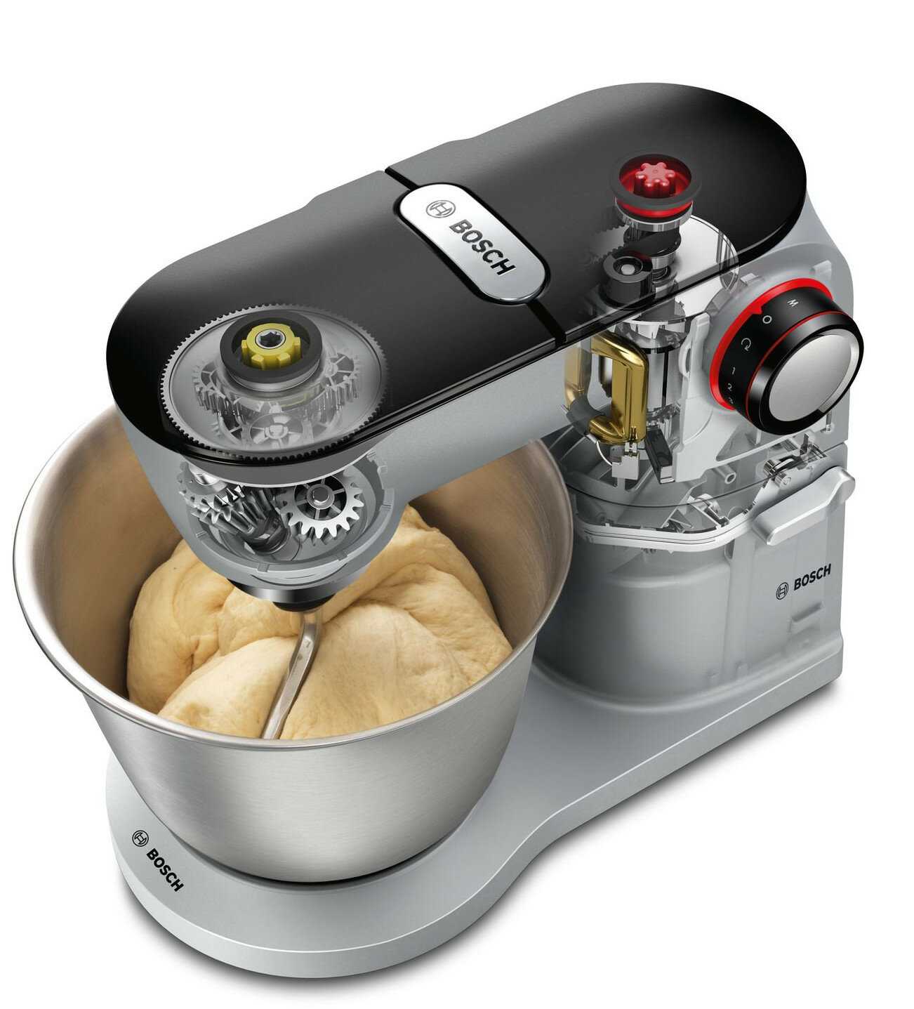 Srebrno-czarna maszyna kuchenna Bosch z miską wypełnioną ciastem. Widoczne są części maszyny.