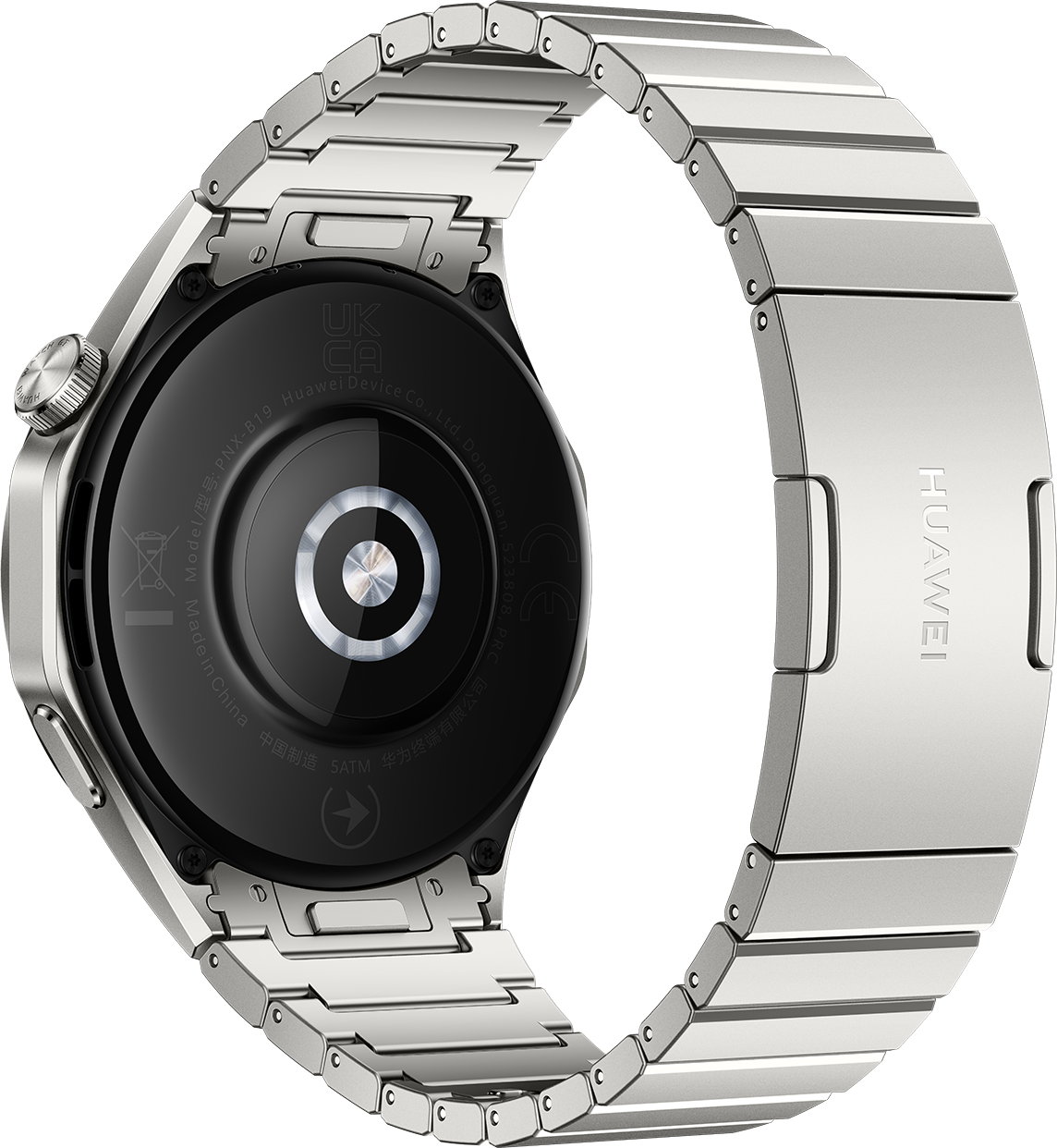 Silver watch with a metal band. The back shows text and a sensor. The watch is on a black surface.