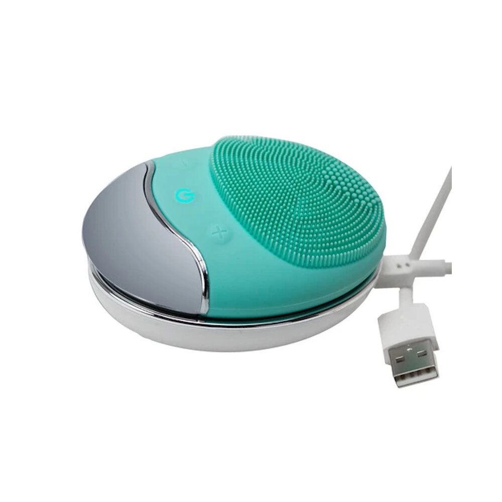 Turkusowe urządzenie do oczyszczania twarzy z silikonowymi włoskami i kablem USB.