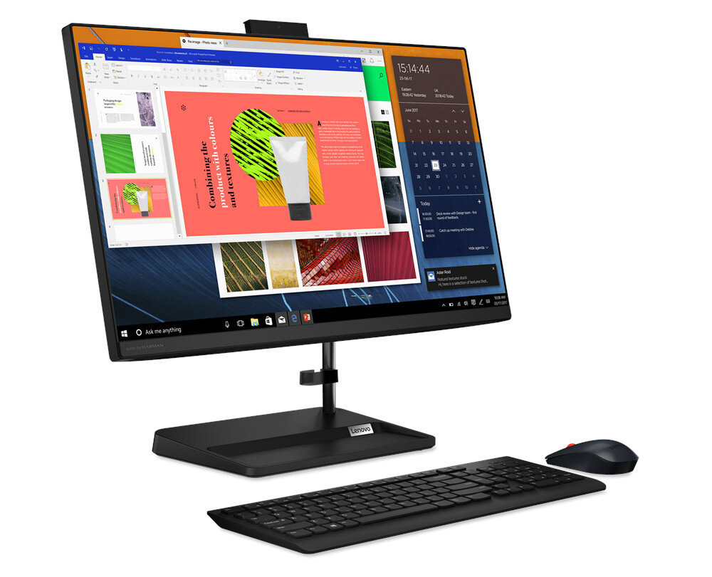 Monitor z klawiaturą, myszą na białym tle.