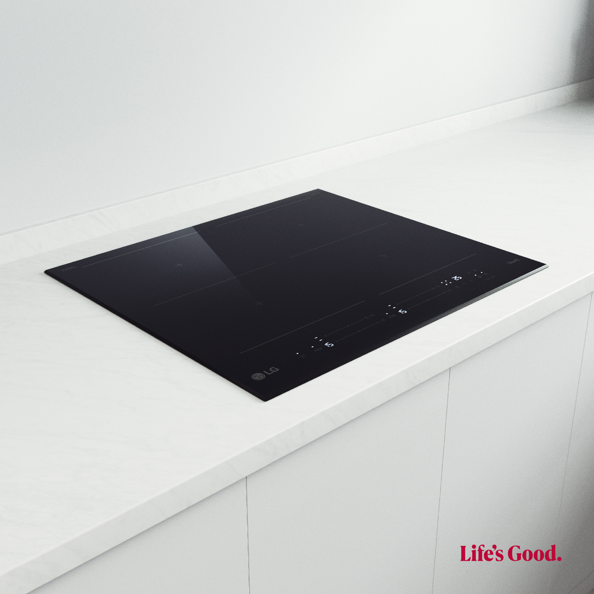 Una placa de inducción negra sobre una encimera blanca, con el logotipo de LG.