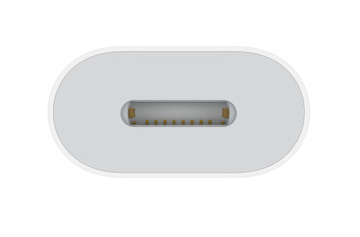Close-up of a white USB-C connector, showing the oval shape, the central port, and the internal pins.
