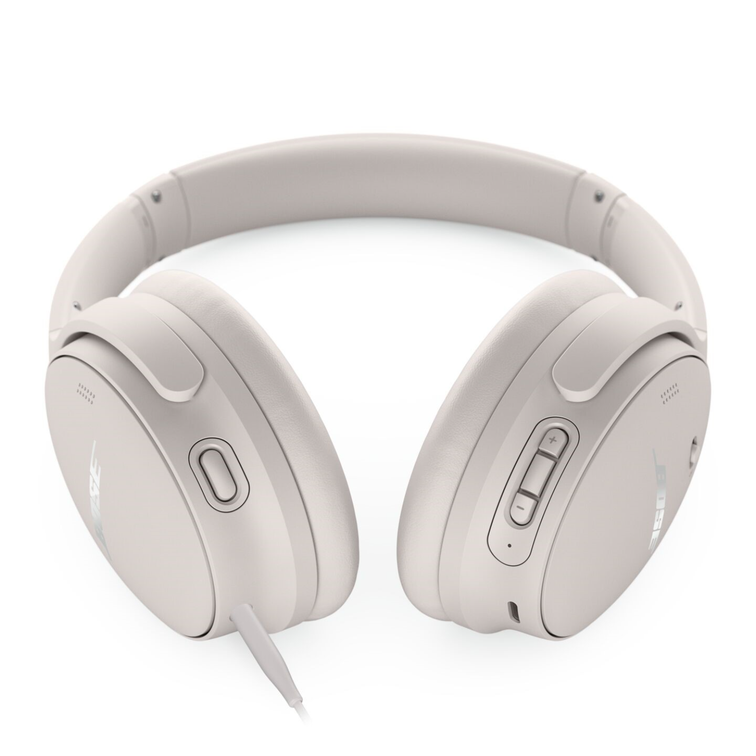 A pair of light gray Bose headphones with control buttons and a cable.