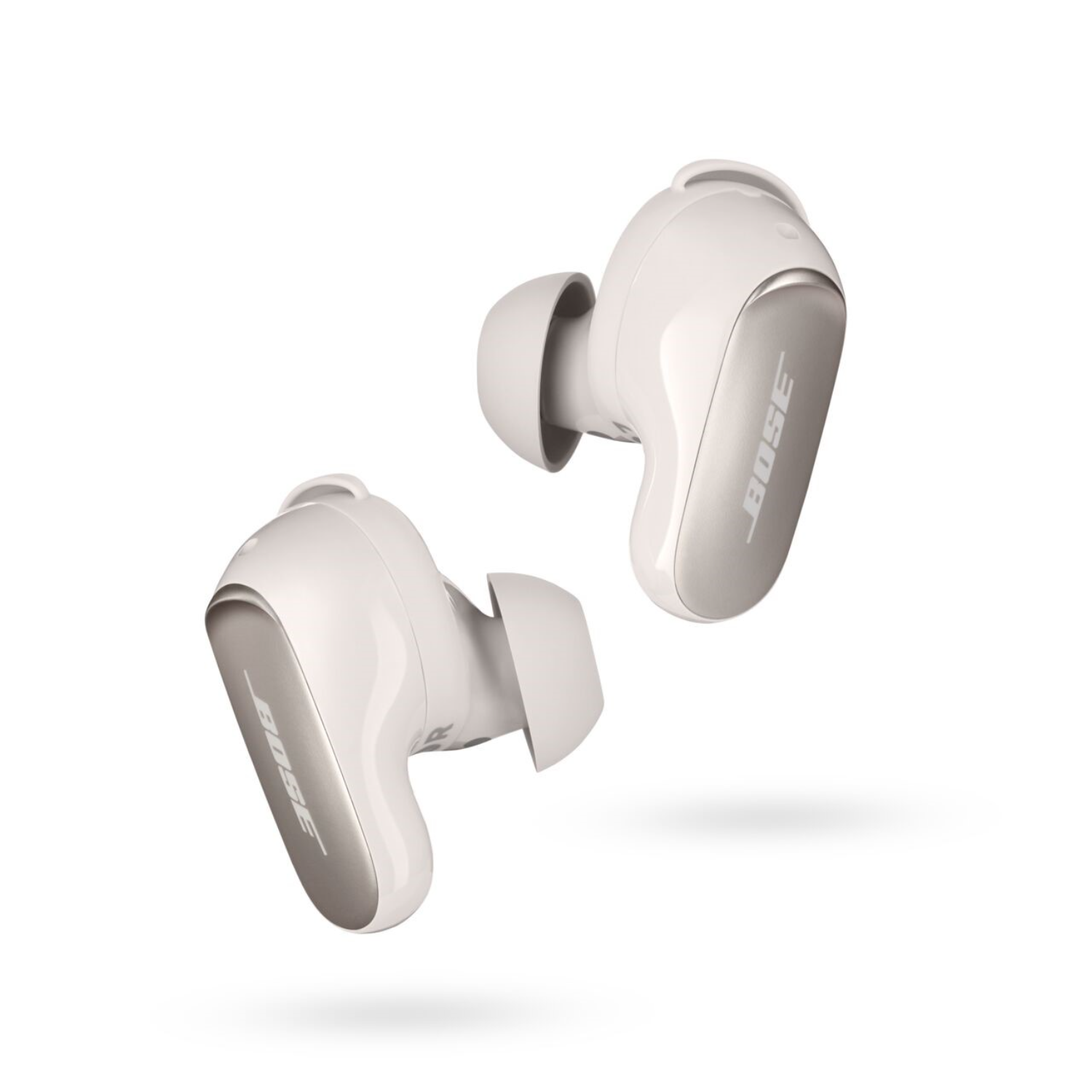 Two white Bose earbuds, angled, with silver accents, floating against a white background.