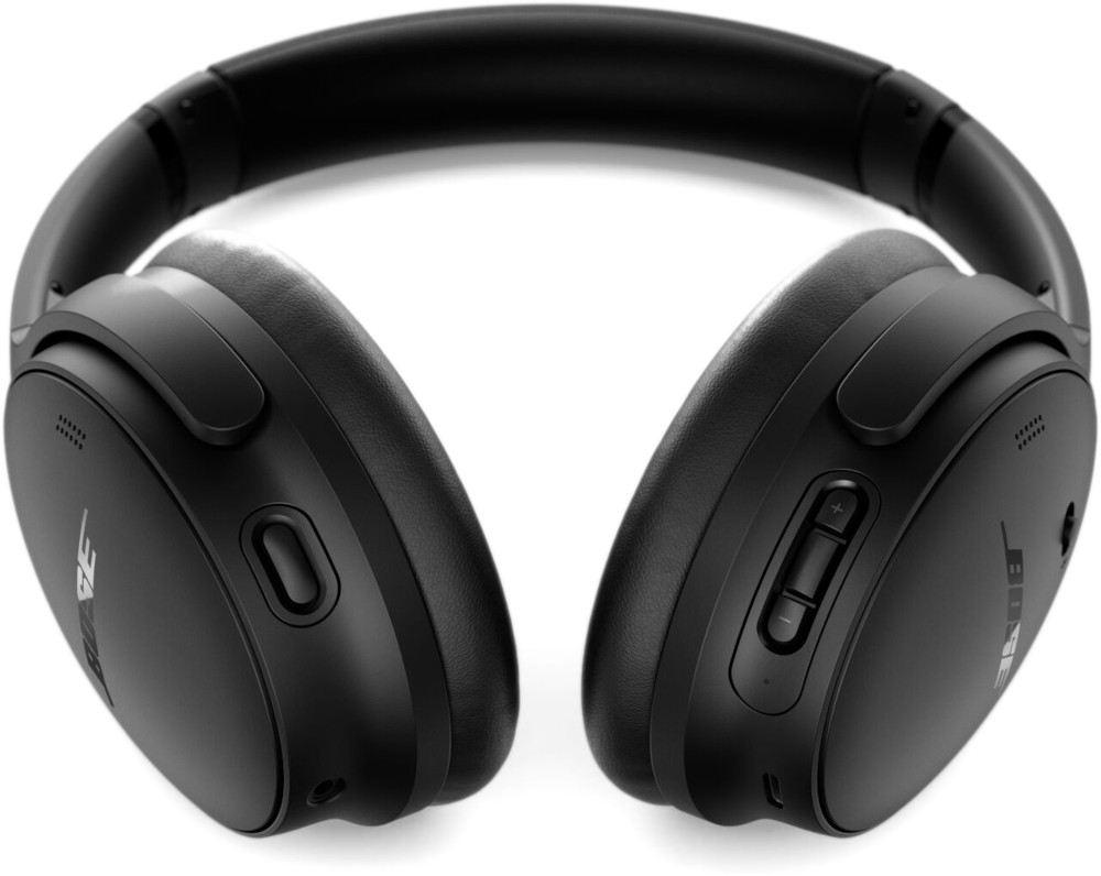 Black Bose headphones with buttons. The headphones are on a white background.