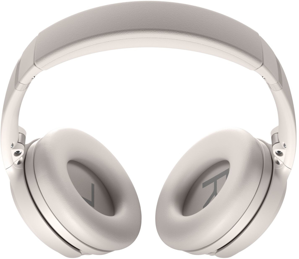 Light gray over-ear headphones with a headband. The earcups have a logo.