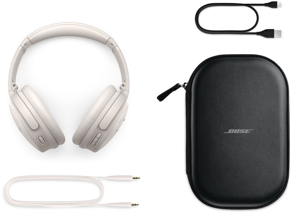 White headphones, black case, and two cables are on a white background.