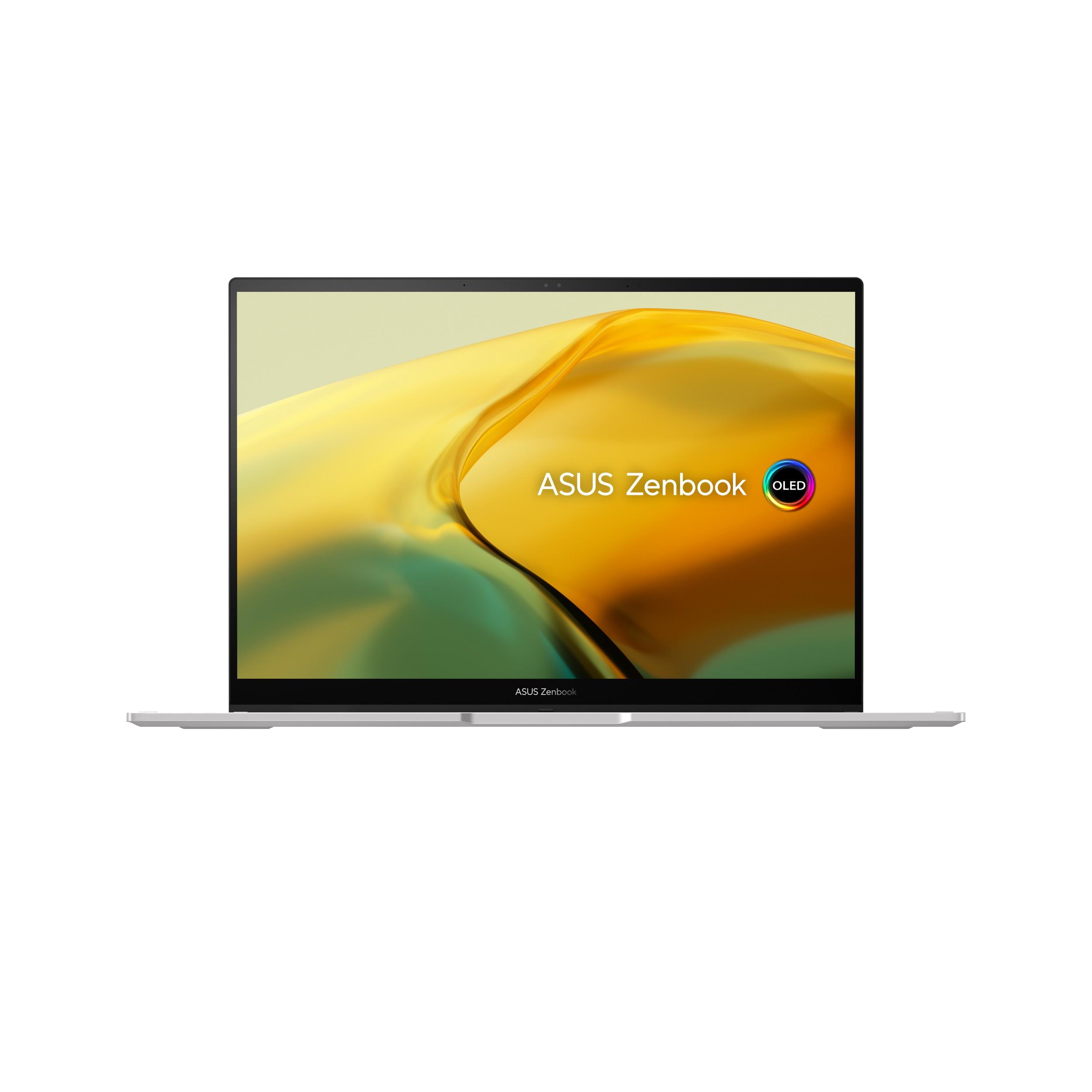 Portátil plateado con los logotipos ASUS Zenbook y OLED en pantalla.