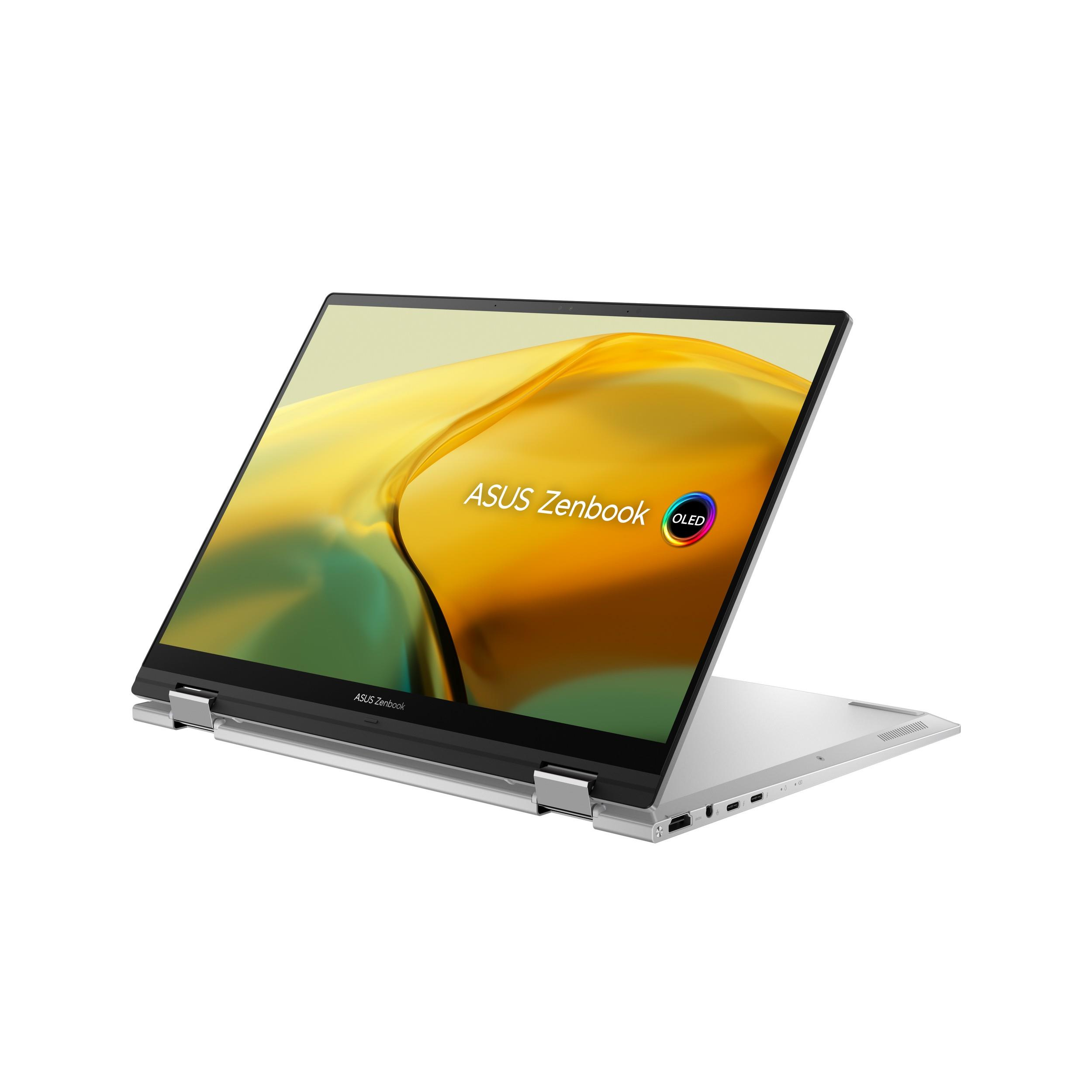 Portátil plateado abierto, pantalla con fondo amarillo y naranja. Logotipo ASUS Zenbook visible.
