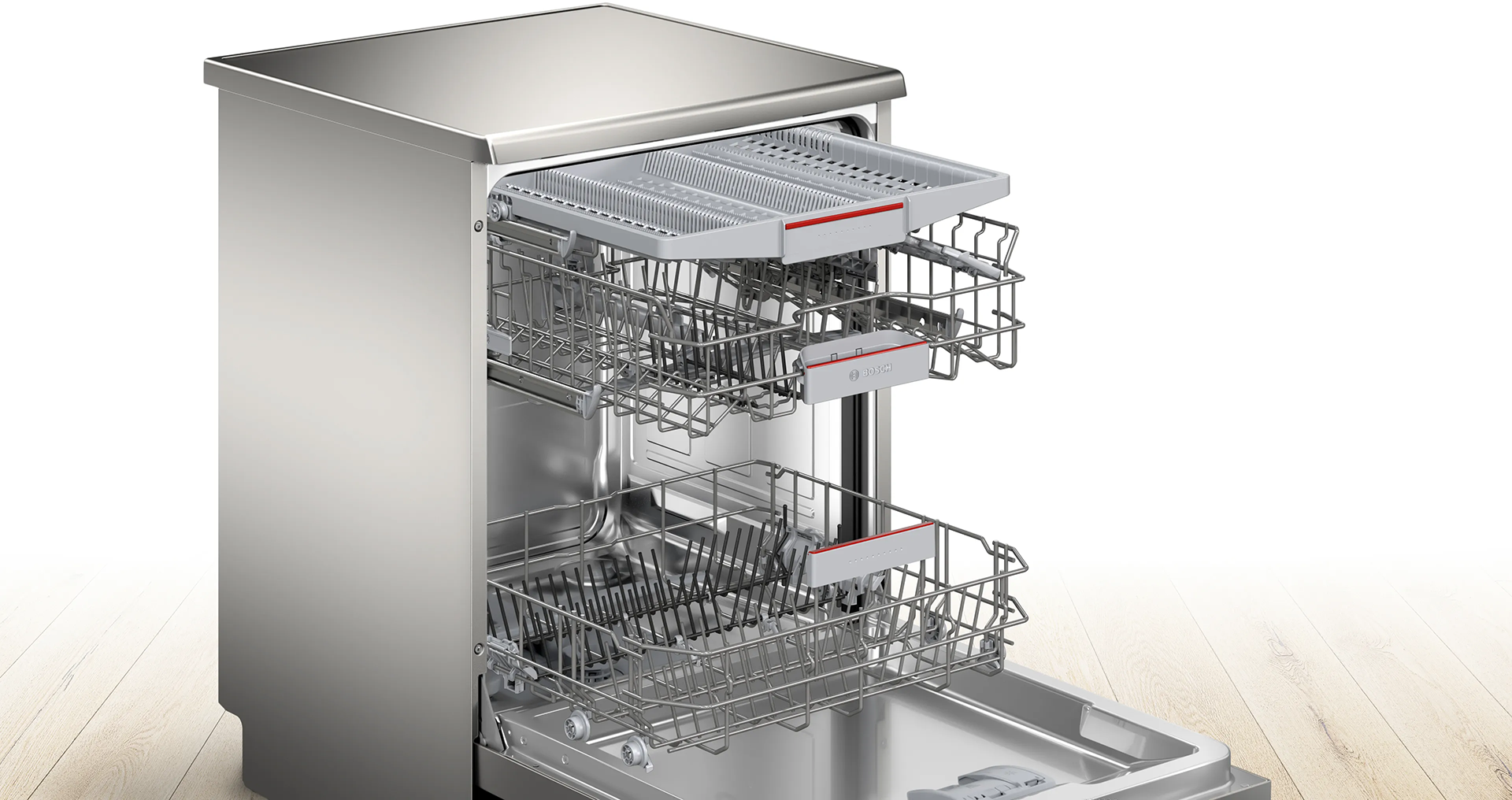 Ezüst mosogatógép, nyitva. Belül edény- és evőeszköz tartók.