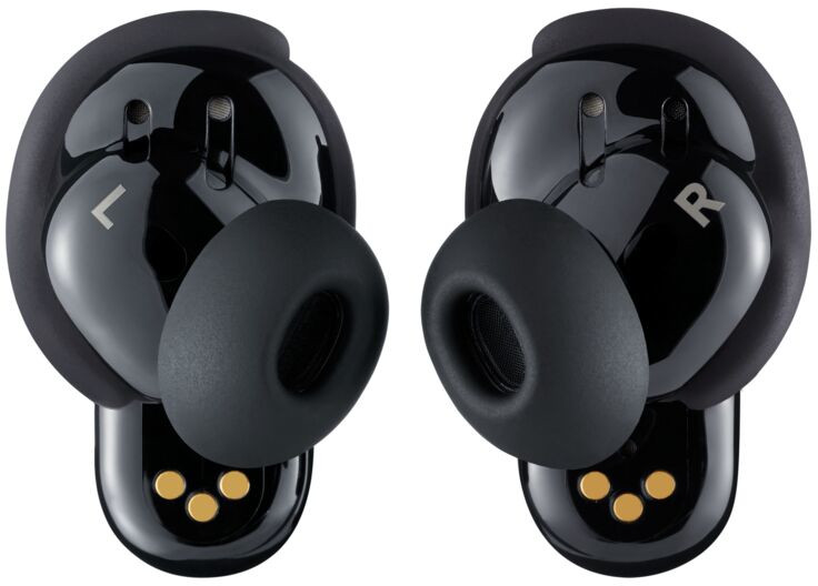 Pair of black wireless earbuds, with 'L' and 'R' markings, on a white background.