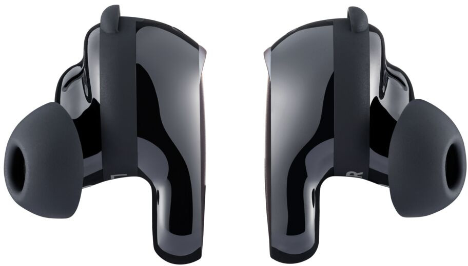Pair of black wireless earbuds. The earbuds have a glossy surface and gray ear tips.