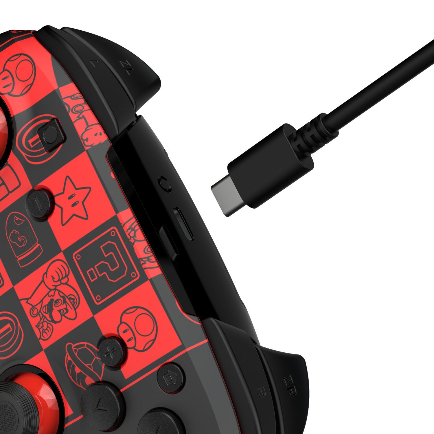 Une manette de jeu rouge et noire sur le thème de Mario avec un câble de chargement noir.