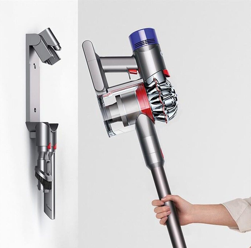 Odkurzacz ręczny i jego uchwyt ścienny.