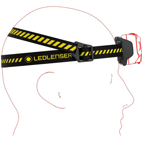 Fej LEDLENSER fejlámpával, sárga-fekete szíjjal rögzítve.
